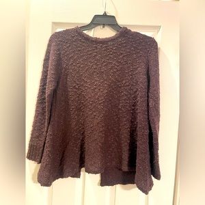 Women’s sweater with open back